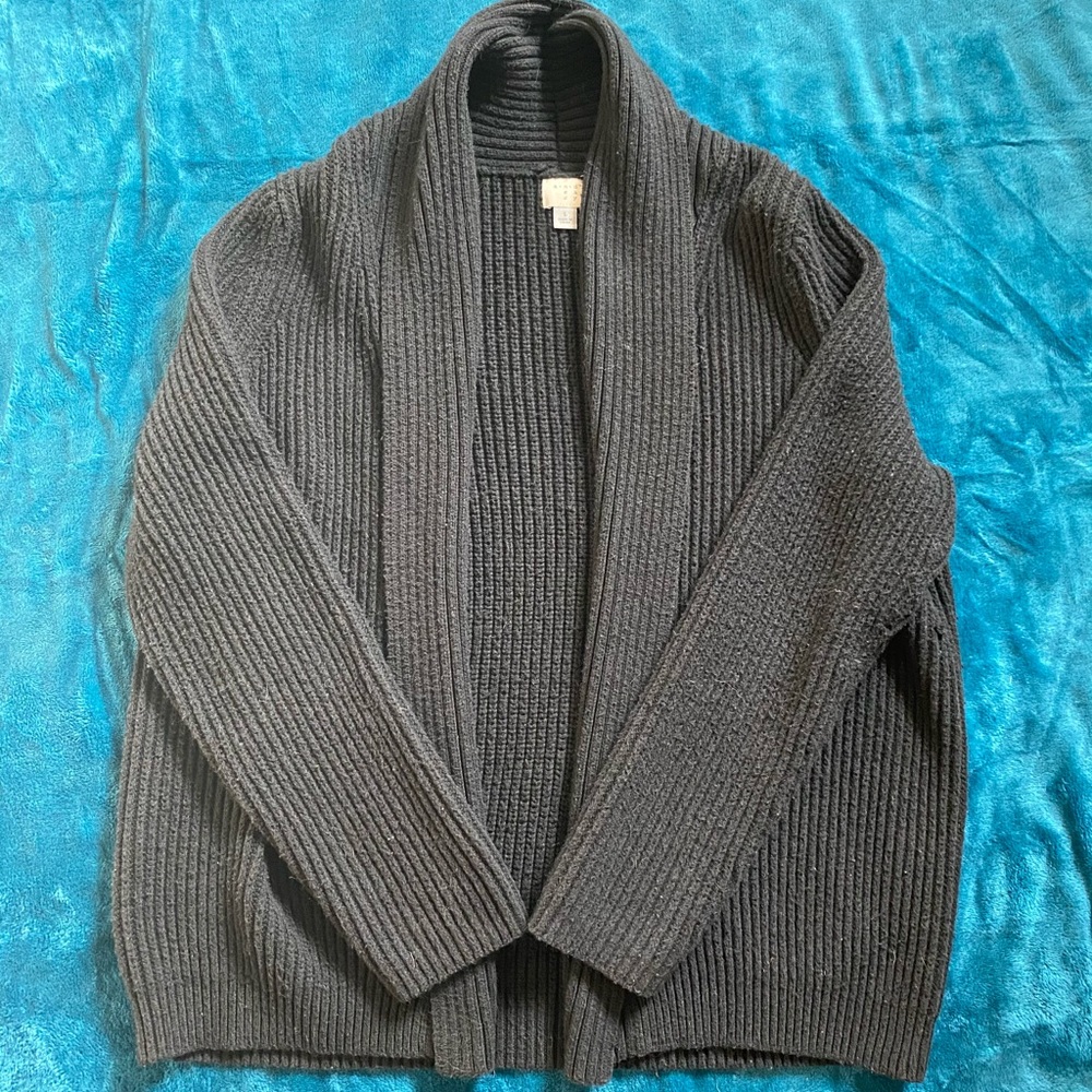 A New Day black sweater